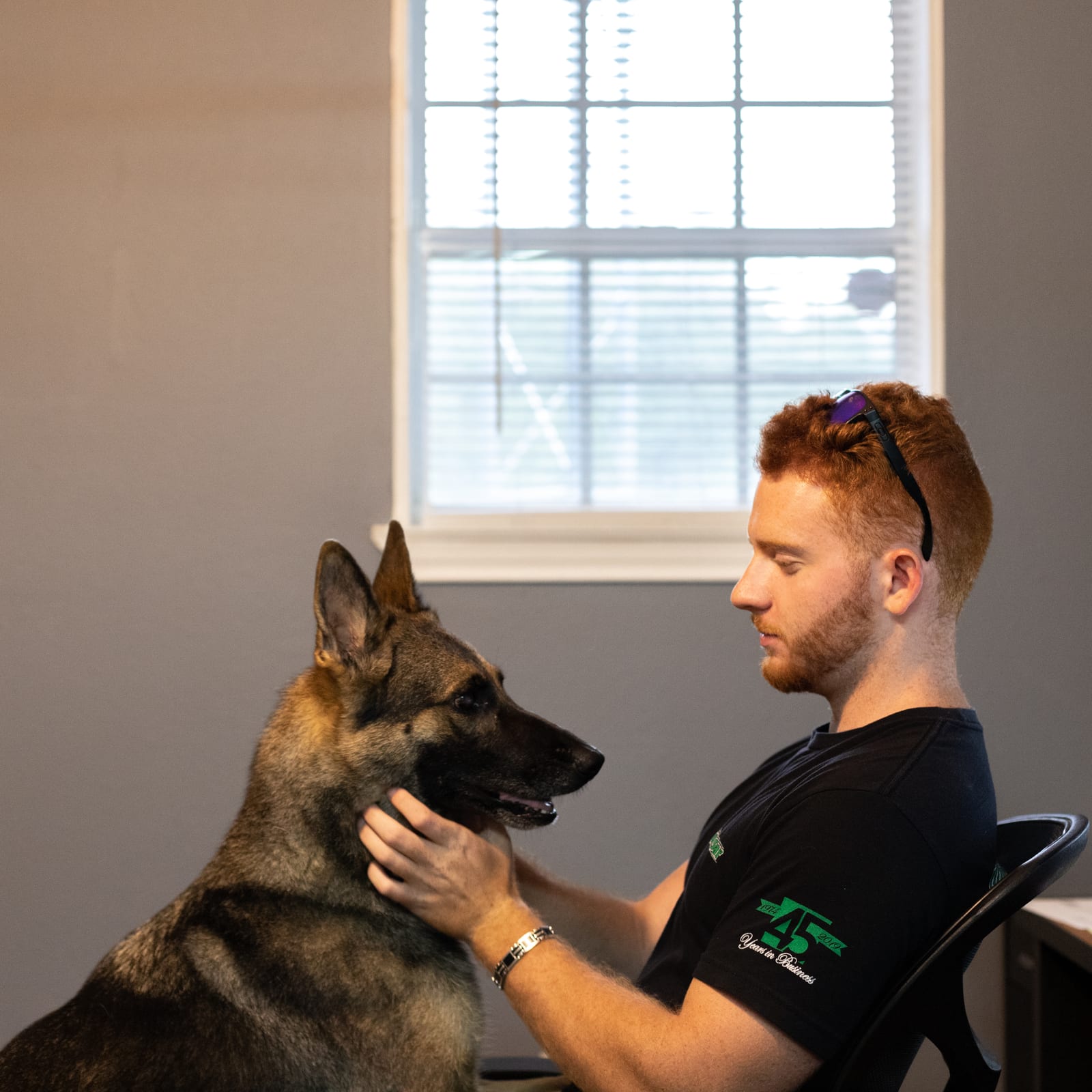 A Pulsar team member with the office dog